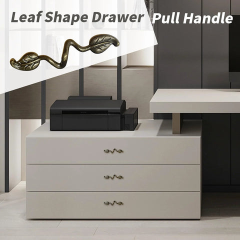 Leaf Shape Drawer Pull Handle Set In Vintage Bronze Finish shown on modern dresser with twig branch design, made in zinc alloy.
