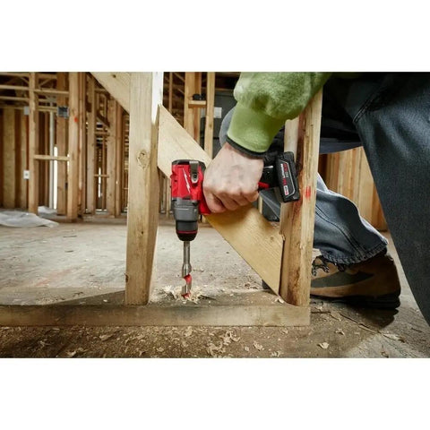 Badass Cordless Compact Drill Driver With Half Inch All Metal Chuck And Mechanical Clutch being used to drill into wood in tight space.