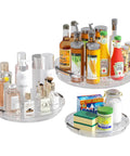 Three Pack Lazy Susan Turntable Organizer For Kitchen Storage Rotating Spice Rack Clear Acrylic holding various kitchen items