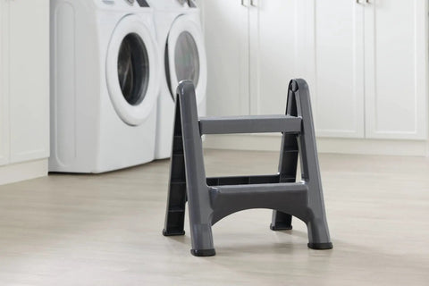 Two Step Folding Foot Stool 14 Inch High Gray Lightweight 300 Pound Capacity in home laundry room setting