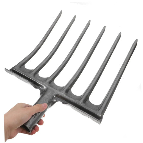 High-Performance Steel Soil Loosening Fork With Four-Tooth Design held by hand, showcasing durable construction for garden prep