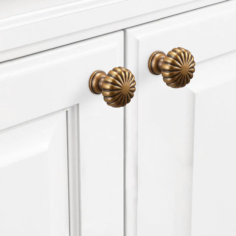 10 Pack Antique Brass Kitchen Cabinet Knobs Set With Retro Drawer Hardware Aged Bronze Zinc Alloy Handles installed on white cabinet
