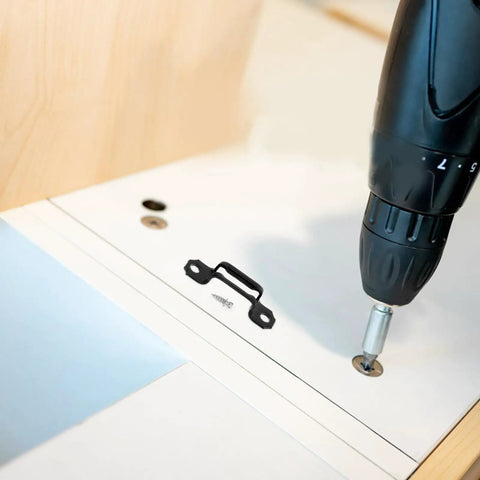 100 Piece Invisible Connector Screws Zero Drama Hidden Furniture Fasteners used with a power drill for cabinet assembly.