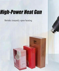 High-Power Heat Gun demonstrating shrink sealing on product boxes with a smooth finish for packaging efficiency.