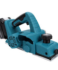 Heavy Duty Cordless Hand Planer With A Beefy 15000 RPM Brushless Motor, Slick Two Millimeter Cut Depth, And Tough Carbide Blades, side view.