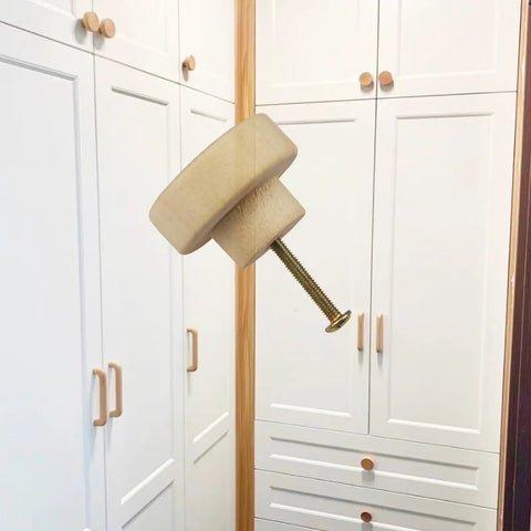 16 Pack Wood Cabinet Knobs 1.53 Inch Flat Top Round Dresser Drawer Knobs Unfinished Furniture Pull Handles Cupboard Door Hardware 39mm Diameter For DIY Upgrades With Screws in front of white cabinets.