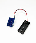 Hands On Soldering Practice Kit For Electronics Newbies Do It Yourself Learning Board with battery holder and wires visible