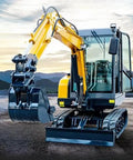 Compact Hydraulic Mini Excavator For Home And Farm Projects with yellow and black arm, parked outdoors.