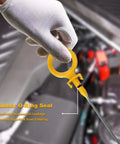 Gloved hand holding Plug And Play Engine Oil Dipstick For Audi A4 2.0L L4 Quattro 2005 2008 2009 Cabriolet with O-ring seal