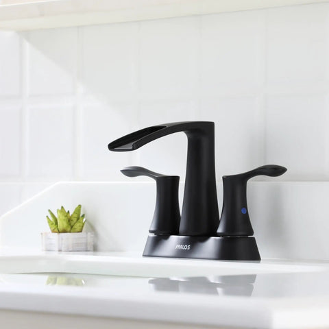 Two-Handle Waterfall Bathroom Faucet In Matte Black With Pop-Up Drain And Metal Supply Lines For Quick Install And Sleek Open-Channel Spout Vibe For A Modern Bath Upgrade - close-up view on white sink
