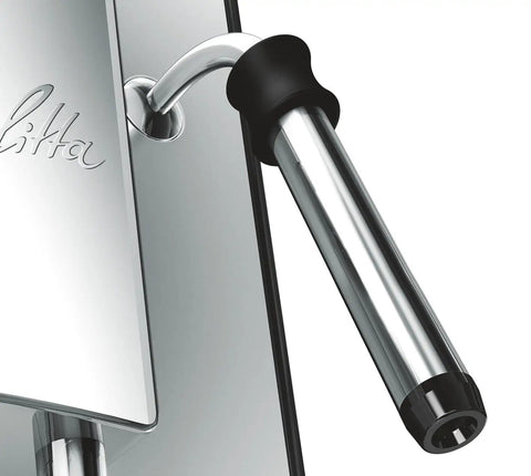 Sleek chrome milk frother attachment on the Game Changing Bean To Cup Automatic Coffee Maker With Creamy Frothed Milk And Slick Silver Black Design For Your Daily Grind And Smooth Espresso Or Cappuccino Sips All Week Long.