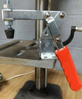 Heavy Hitter Vertical Toggle Clamp 10 Pack Set delivering 225 lb clamping force with red handle on a workbench.