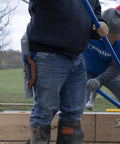 Workhorse Tool Hook And Trowel Hanger A Dependable Hand Tool Carrier on tool belt, holding masonry tools on job site.