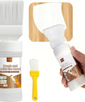 No Sweat White Touch Up Paint For Wood Doors Cabinets And Furniture Built In Brush glides on wood surface with yellow brush.