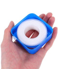 Top Shelf PTFE Adhesive Seal Tape 10 Rolls Of Water Leak Repair Wrap For Pipes And Threads Gonna Save Ya Time With This Ninja Tight DIY Plumbing Fix Daily in hand, showcasing compact design.