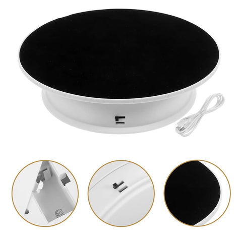 Ultimate 360 Degree Electric Turntable Rotating Display Stand With Two-Speed Adjustment For Jewelry Watches Photoshoot And Commercial Showcase using black velvet and white base.