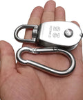 Heavy Duty Stainless Steel M25 Single Pulley Block Set With Spring Snap Hook For Lifting And Rigging, One Inch Sheave Pulley Wheel, Swivel Snatch Pulley Block, 330 Lbs Load Capacity, Anti Rust And Wear Resistant, 2 Pack shown in hand