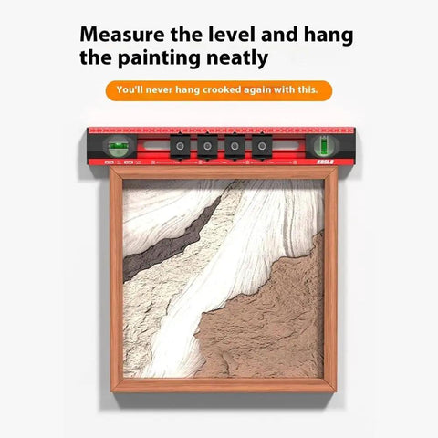 BXRSRTZ Spirit Level Gift Idea Decor Kit positioned above a photo frame, showcasing the level's dual bubble vials and sliding indicators.