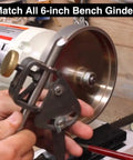 Close-up of 6 Inch CBN Grinding Wheel With Adjustable Bore And Auto Adapter Fitting on bench grinder