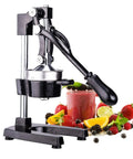 Cast Iron Manual Citrus Juicer Heavy Duty Orange Press Professional Bar Quality Hand Squeezer with fruits and smoothie.