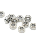 Super Cool Set Of 10 Tiny 2x6x3mm Mini Ball Bearings Made From Super Durable Chrome Steel in a pile, ideal for nail drill tools.