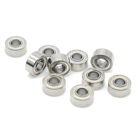 Super Cool Set Of 10 Tiny 2x6x3mm Mini Ball Bearings Made From Super Durable Chrome Steel in a pile, ideal for nail drill tools.
