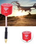 Red 5.8Ghz FPV Drone Antenna High Gain Bendable Directional For Steady Pro Grade Video Transmission With 100MHz Bandwidth MMCX Straight Connector Ideal For Race Drones in front of a flying drone