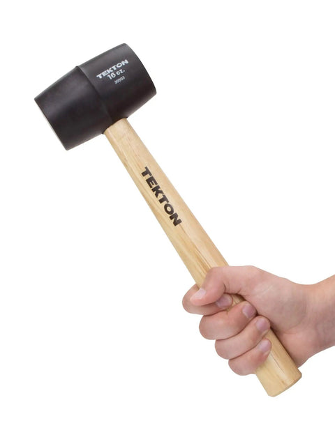 Wood Handle Rubber Mallet Set, 3-Piece With 8 Oz 16 Oz And 32 Oz Heads, contoured hardwood handles, black rubber head, side view in hand.