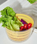 No Sweat Electric Salad Spinner With Single Button Control For Swift Leafy Greens Washing And Thorough Fruit Vegetable Drying Generous Four Liter Capacity with lettuce and tomatoes.