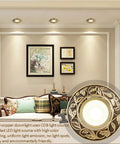 Sleek Set Of 12 Premium 3.8 Inch Brass LED Recessed Can Lights, Dimmable Gold Adjustable COB Downlights For Living Room installed in a modern setting.