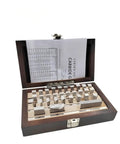 Top Shelf 32 Piece High Speed Steel Gage Block Set Engineered For Micrometers And Table Saw Checks featuring a wooden case and measurement blocks.