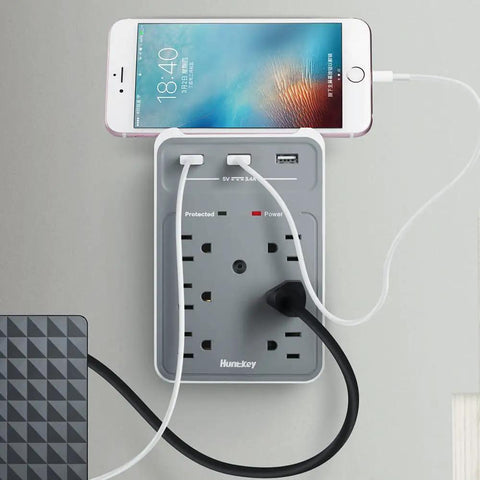 Nine In One Power Strip Extender With Six AC Outlets Three USB Ports And Phone Cradle 1080 Joules Surge Protector In Use