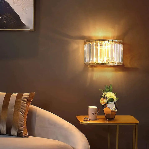 BUNCC Modern Minimalist Metal Wall Sconce, E14 LED Crystal Indoor Wall Light Fixture mounted beside a stylish sofa.