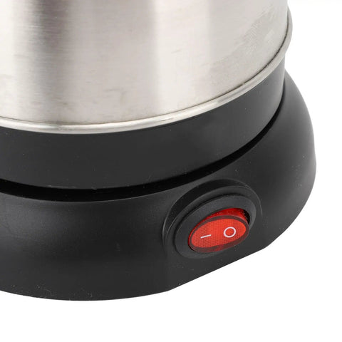 Close-up of the base switch of Electric Turkish Coffee Maker 600Ml Stainless Steel Pot With Anti Scald Handle.