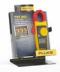 Pro Grade Clamp Meter For Electricians With True RMS Readings on display stand, measures AC current to 400 A and voltage to 600 V.