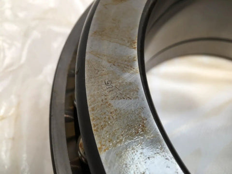 Close-up of Thrust Ball Bearing 150 mm Bore Open Brass Cage For Easy Lubrication ABEC 5 Precision detailing surface texture.