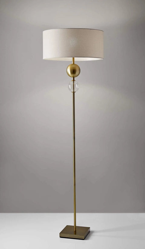 Chole Floor Lamp 69 Inch Tall with antique brass finish, clear glass globe, off white textured shade, 3 way rotary socket.