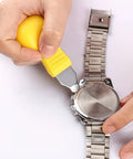 All In One Hand Tool Watch Repair Kit For Precision Back Cover Opening And Lifting shown in use on a metal watch.
