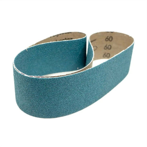 Tough As Nails Zirconia Sanding Belts 2 X 36 Inch For Belt Grinders Rip Through Steel Deburr Polish Sharp Blades Killer Finish For Knife Making Bench Stands Bang For Your Buck 6 Pack 40 Grit close-up of flexible sanding belt showing green zirconia abrasive.