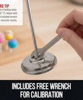 Person adjusting Candy Thermometer With Pot Clip For Deep Frying And Candy Making using free wrench for calibration, white