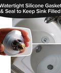 Watertight silicone gasket of Heavy Duty Slick Universal Sink Stopper Replacement Chrome Bath Plug in hand, shows sink fitting.