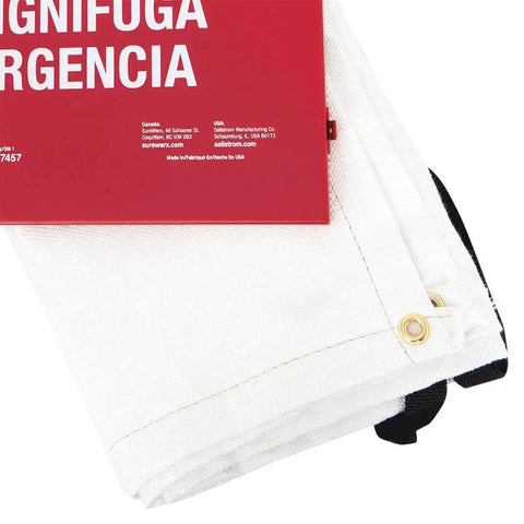 Close-up of Emergency Fire Blanket With Red Steel Cabinet 6 By 5 Feet Fiberglass Material corner with grommet and red label