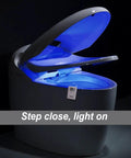 Three Pack 16 Color Motion Sensor LED Toilet Night Light With Auto On Night Glow illuminating open toilet lid