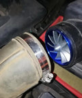 Close-up of a Two Point Five Inch Car Air Intake Turbonator Performance Turbine Charger Turbo Booster With Single Fan Aluminum Universal Kit installed