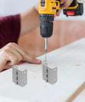 4 Pack Stainless Steel Folding Cabinet Hinges With Silent Operation And Adjustable Functionality, shown with a drill.