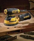 Random Orbit Sander With Variable Speed 5 Inch 3 Amp Corded Electric Low Vibration Design used on wood surface