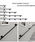 Black Wrought Iron Stair Handrail Wall Mounted Indoor Outdoor Support Bar With Kickass Ergonomic Grip Built Tough For Daily Use Senior Safety Adjustable Length Weather Resistant options displayed on wall.