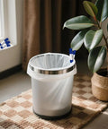 2 Inch Mini Spring Clamps Set Of 30 Heavy Duty Metal Clips on trash bin with plant beside, indoor setting
