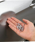 Top Picks For Car Body Repair Welding Studs 50 Pack 4mm Metal Pulling Pins for Dent Removal displayed in hand near a car dent.