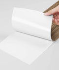 Wood Look Peel And Stick Vinyl Plank Flooring 6x36 Inches, Waterproof Self Adhesive Tiles detail with backing peeled.
